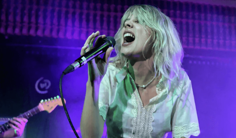 Ellie Rowsell of Wolf Alice on stage