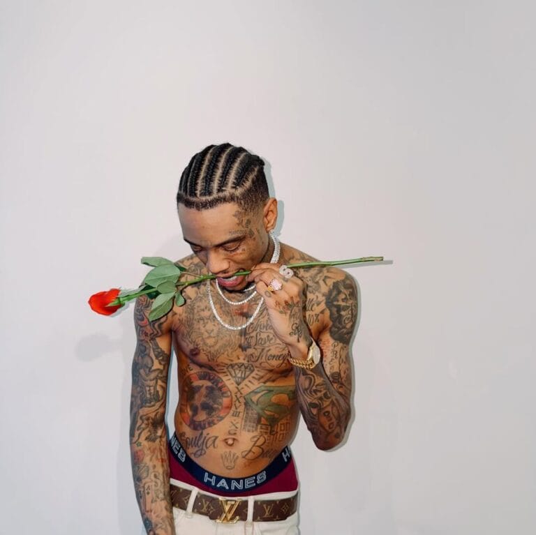 Soulja Boy, topless with a rose in his mouth