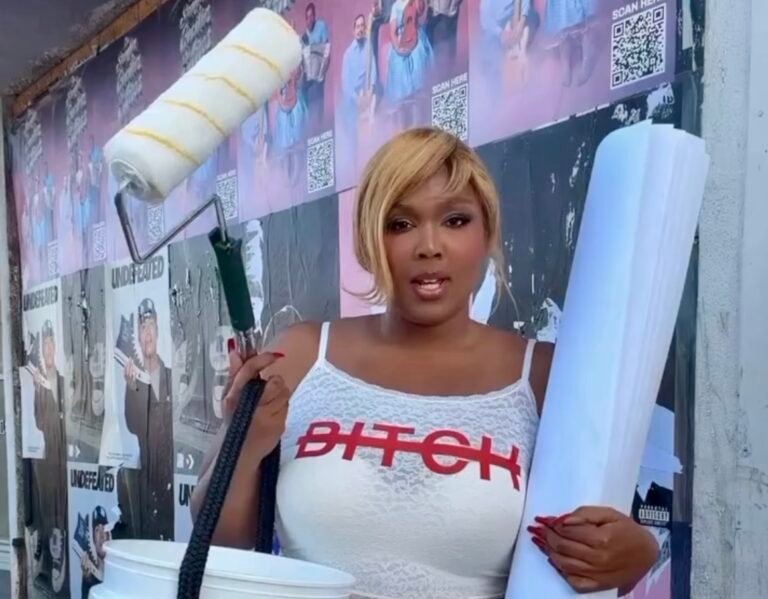 Lizzo hanging album posters