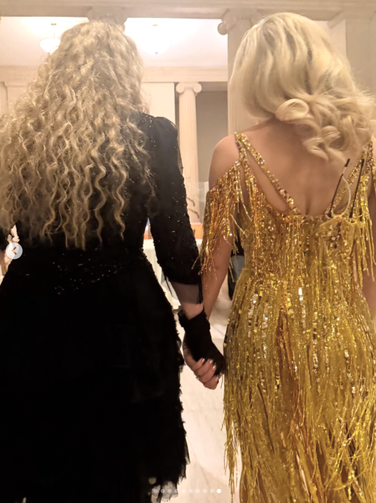 Stevie and Sabrina holding hands