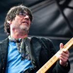 Alex James on stage