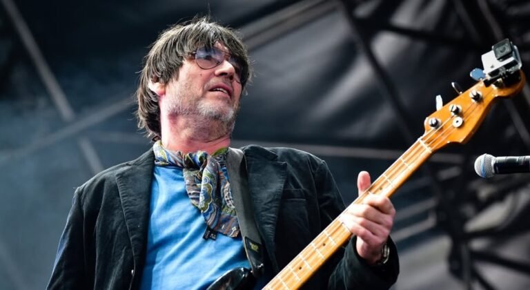 Alex James on stage