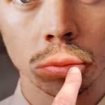 Harry Styles Posters With ‘Kissable’ Silicone Lips Go Viral Across London
