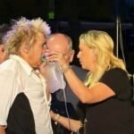 Rod Stewart with oxygen tank on stage