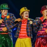 Take That dressed as clowns