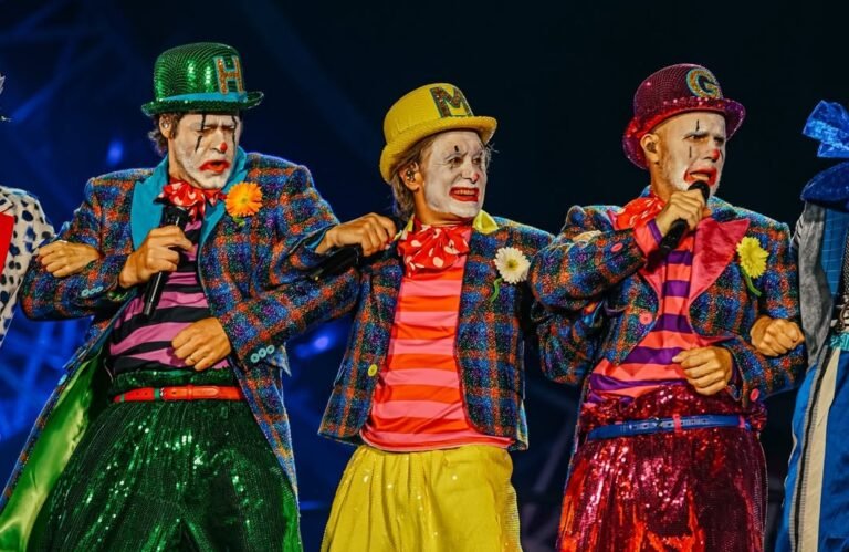 Take That dressed as clowns